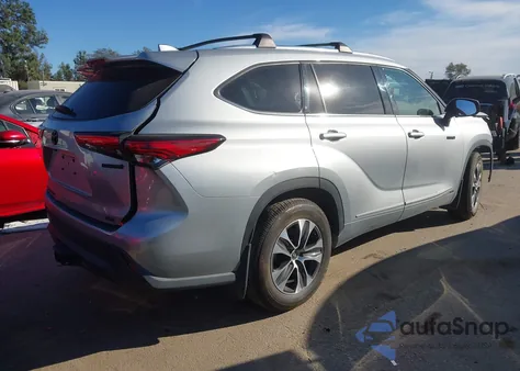 2021 Toyota Highlander Hybrid Xle from USA, damaged, VIN 5TDHBRCHXMS523418